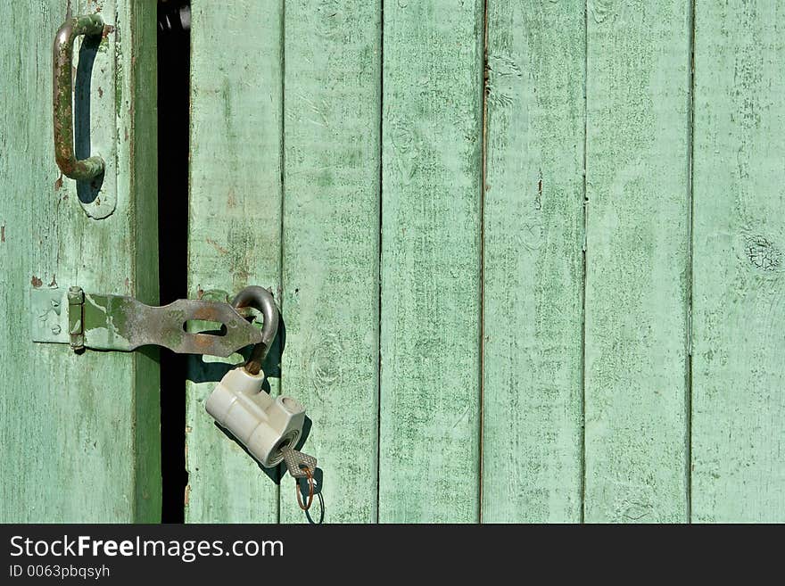 Closed green door background. Closed green door background