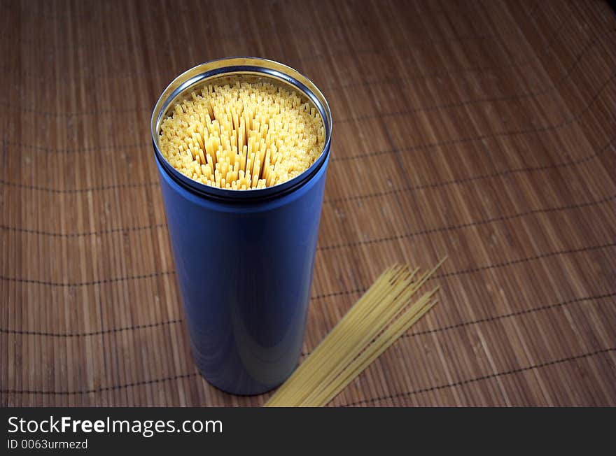 Spaghetti in blue container