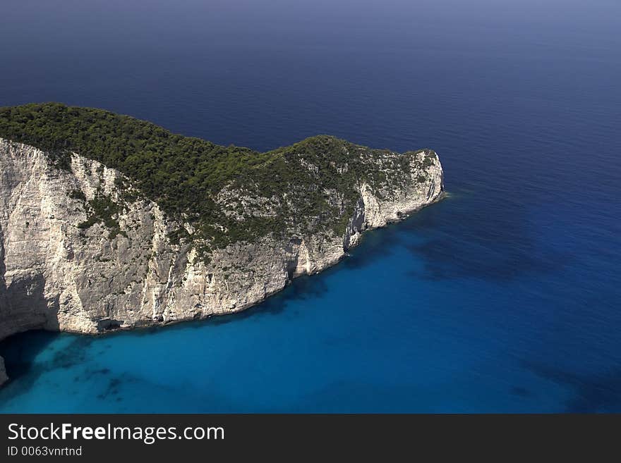 The mountainous coastline at the Greek Isle of Zakynthos also known as Zante, near the shipwreck bay. The mountainous coastline at the Greek Isle of Zakynthos also known as Zante, near the shipwreck bay.