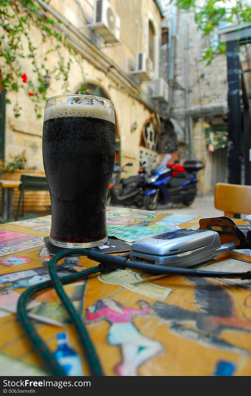 Beer on outdoor pub table. Beer on outdoor pub table