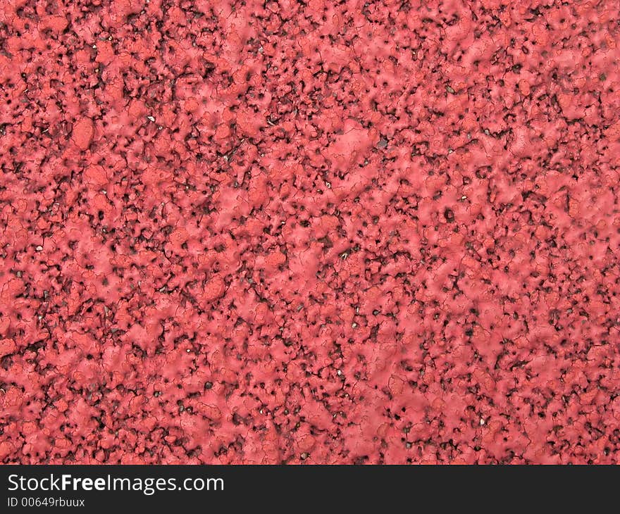 Detail of a polymeric jogging surface. Detail of a polymeric jogging surface.