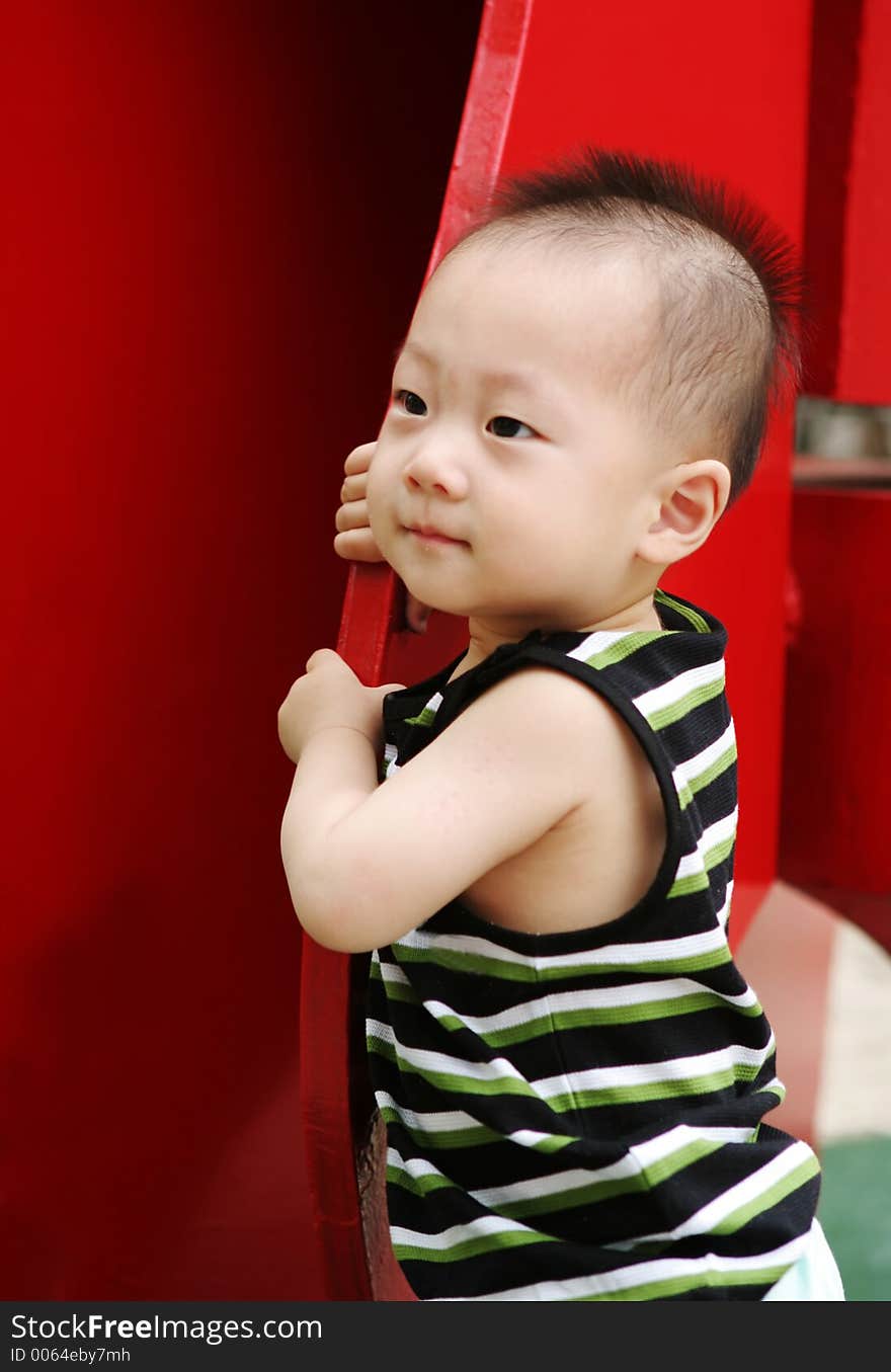 Cute Asian baby with a mohawk hairstyle. Cute Asian baby with a mohawk hairstyle