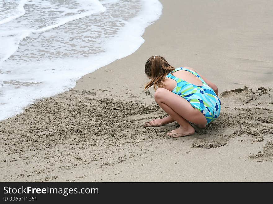 Girl playing on beach