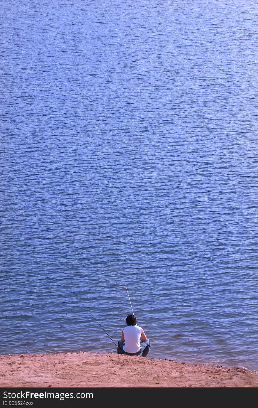 Man fishing alone