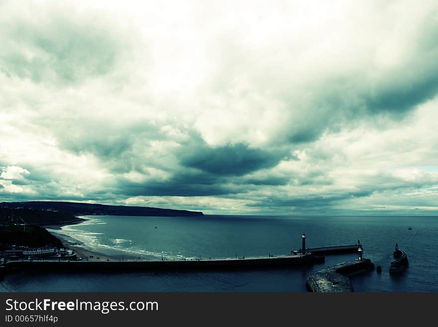 Clouded Coastline Of Whitby Bay, England