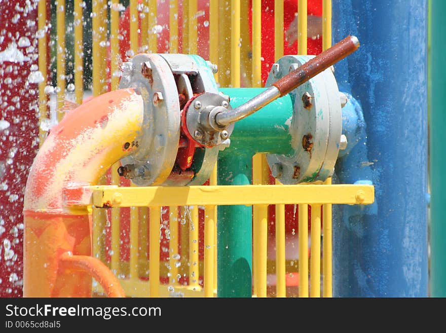 Colorful Lever at a water play area or waterpark