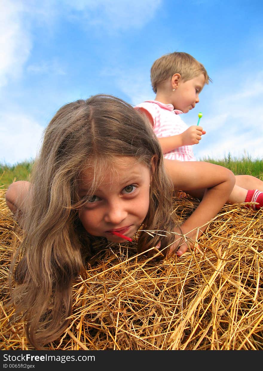 Girls on hayrack