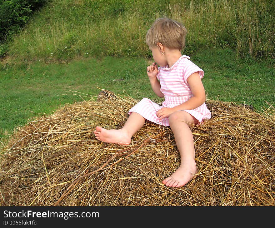 Girl on hayrack