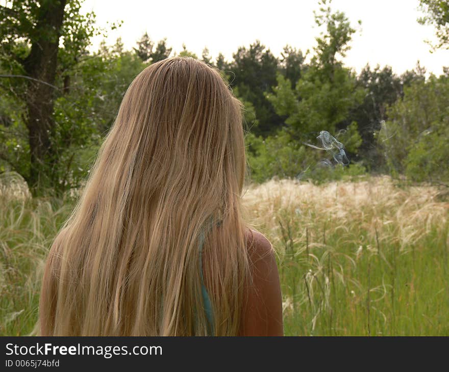 Blonde walking in wood 01