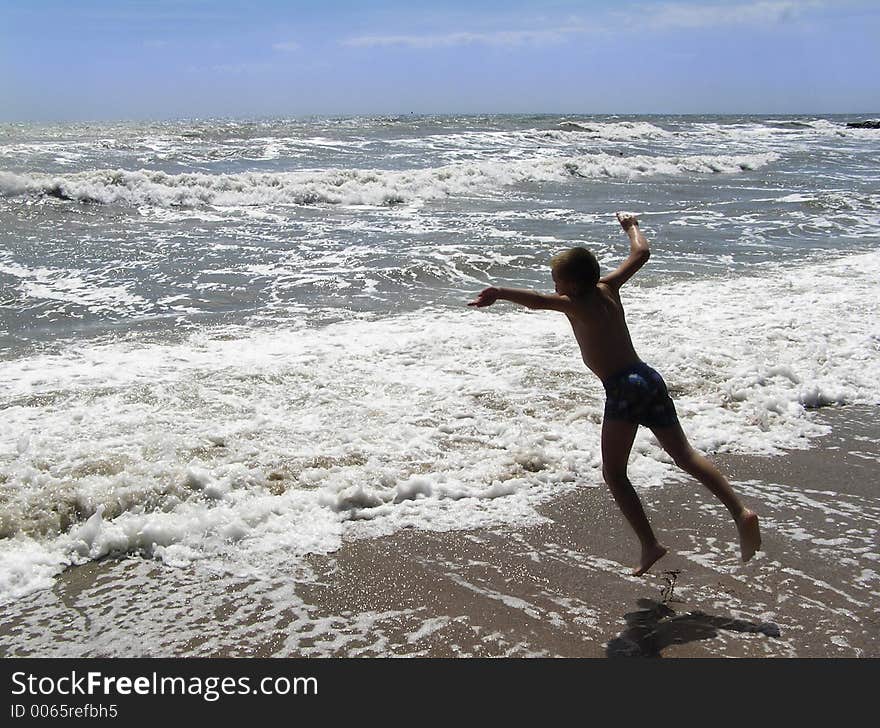 Child at the sea shore