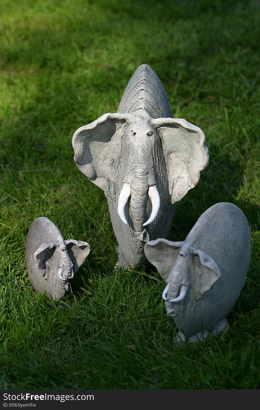 Three clay elephants