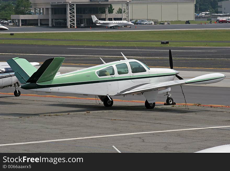 Green and White Plane