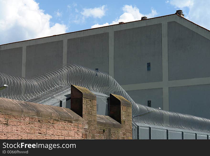 The silver lining of a barbed wire fence at a prison in Germany