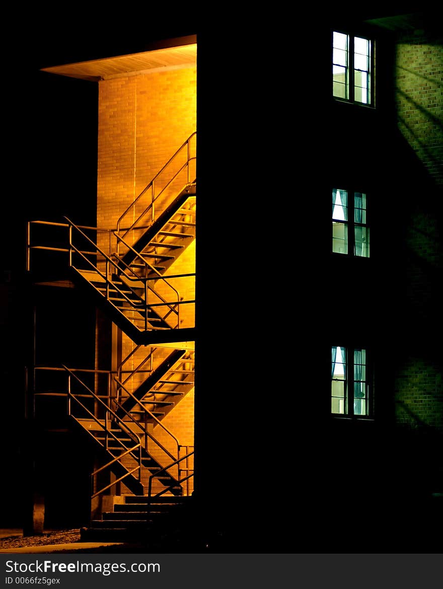 Stairway at night with windows