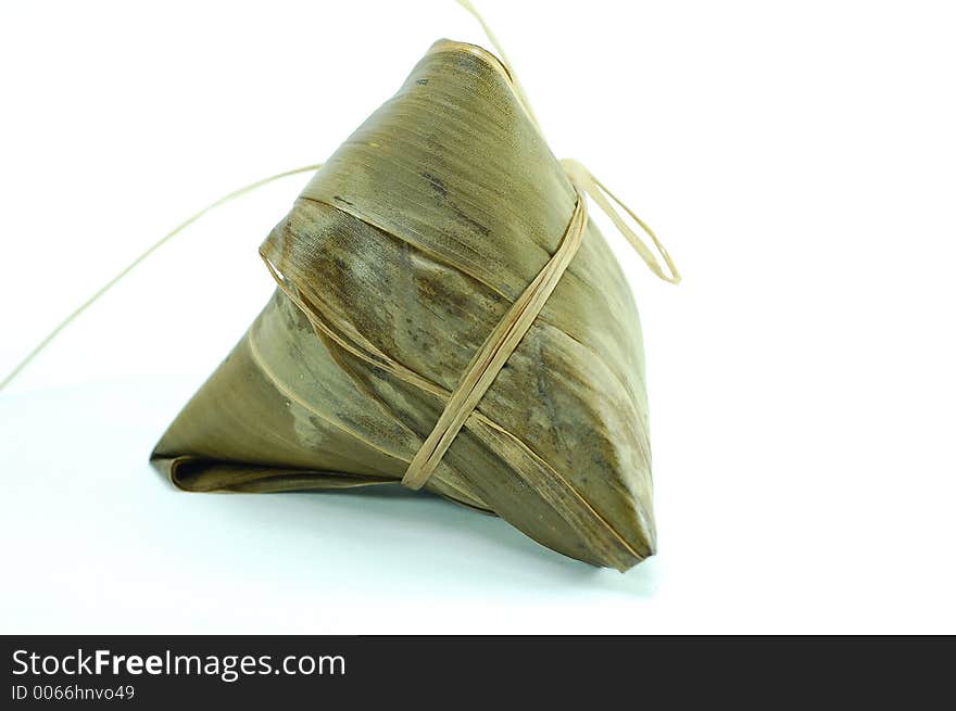 Sticky rice pocket with spice and meat in bamboo leaf. a popular dish amongst chinese. Sticky rice pocket with spice and meat in bamboo leaf. a popular dish amongst chinese