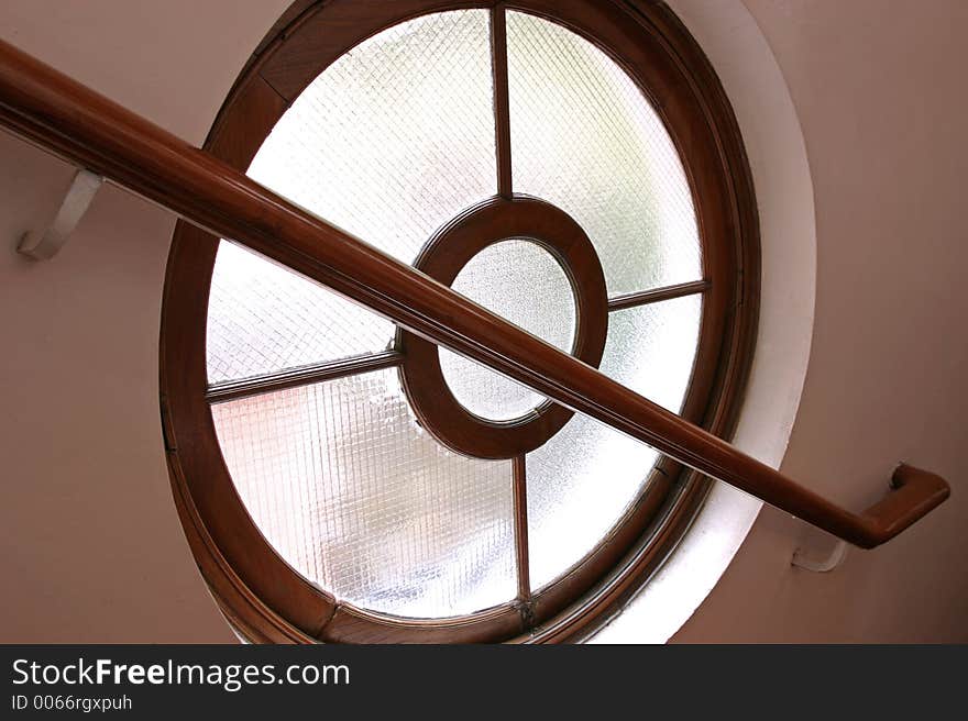 Round window staircase in a building. Round window staircase in a building