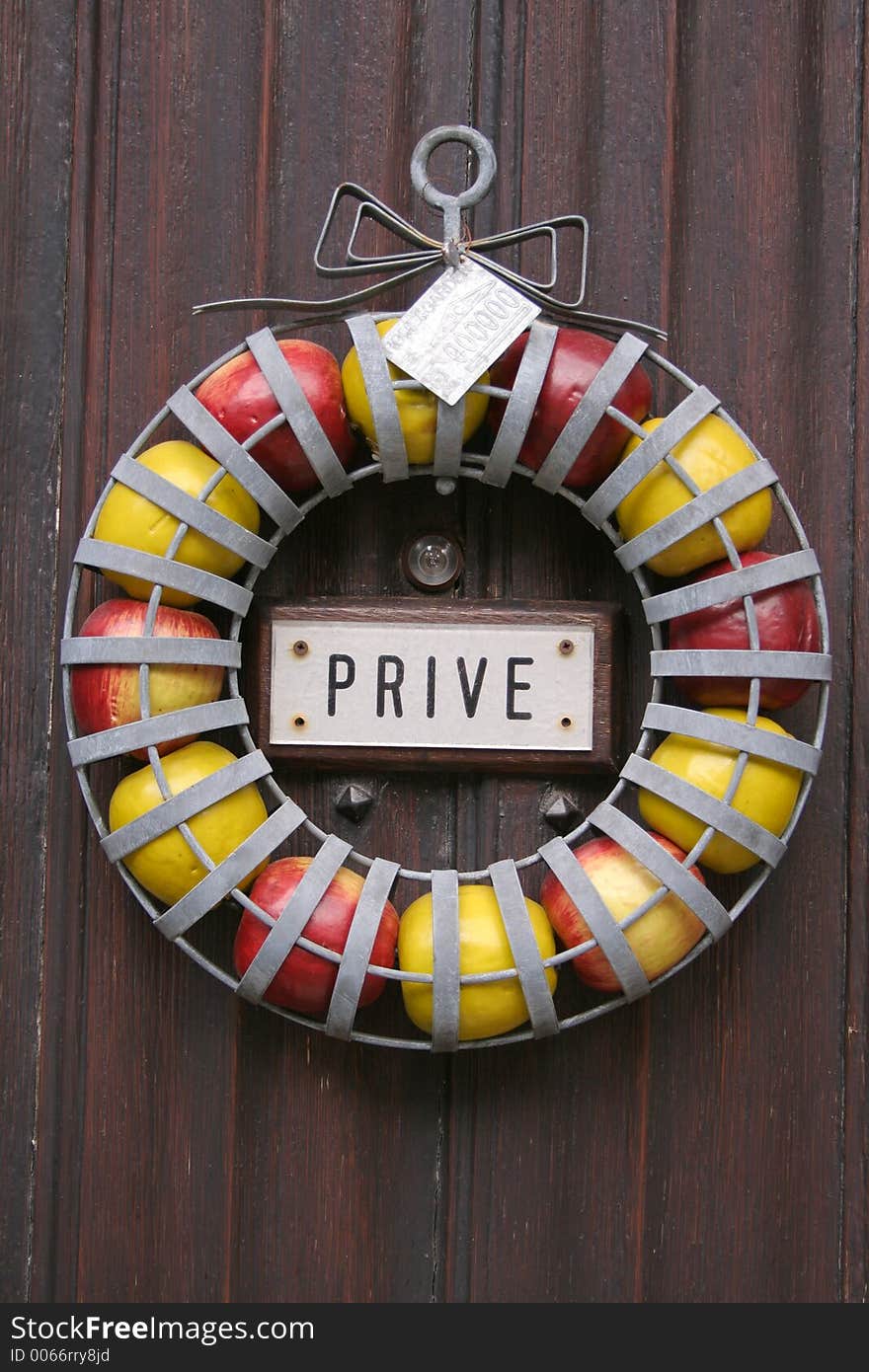 Apple garland on traditional wooden door