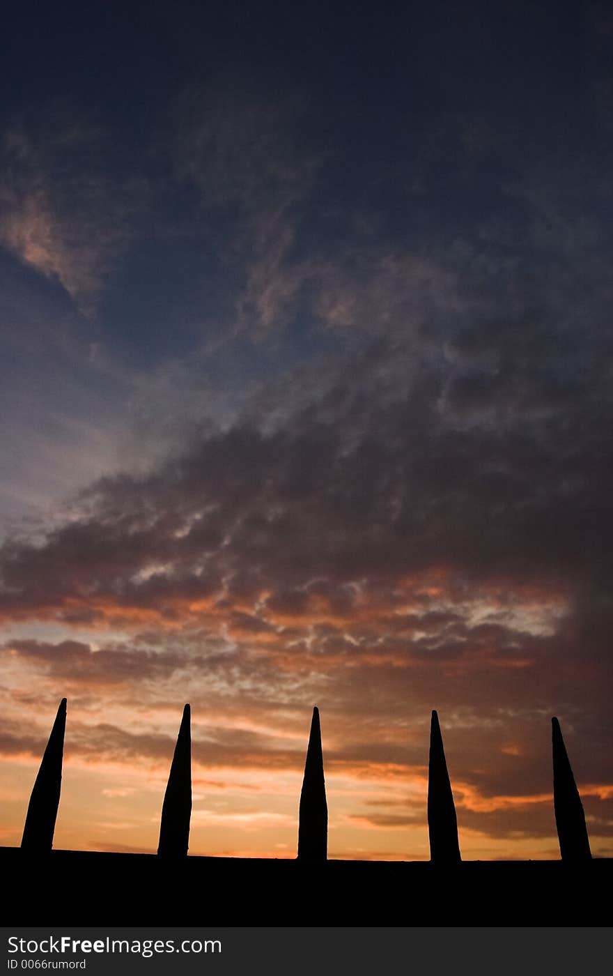 Spikes on sunset background