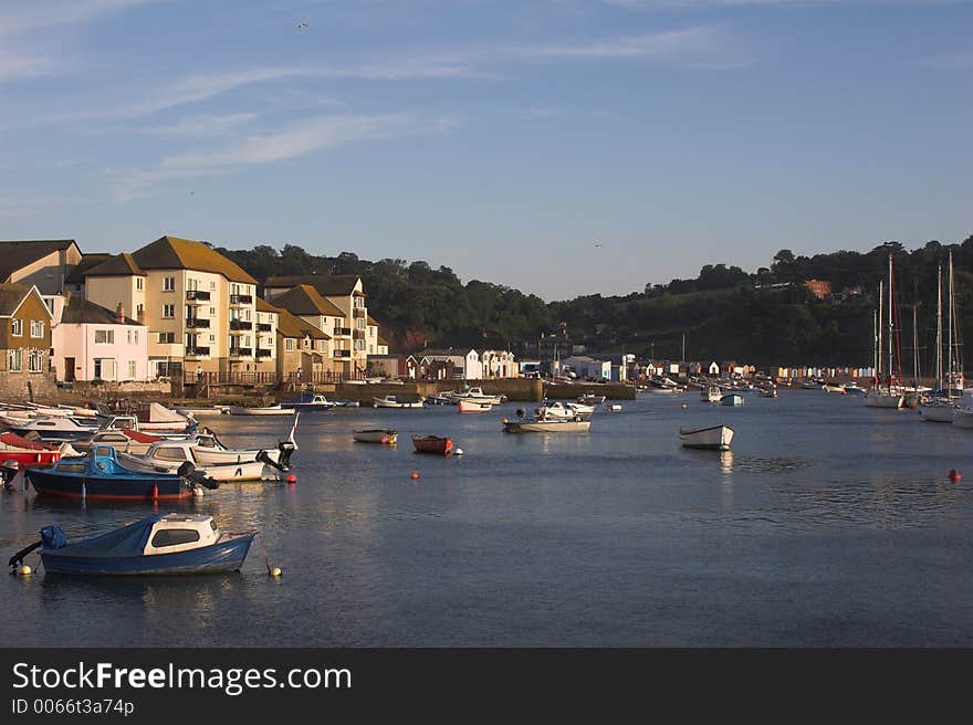 Estuary harbour with boats & houses. Estuary harbour with boats & houses