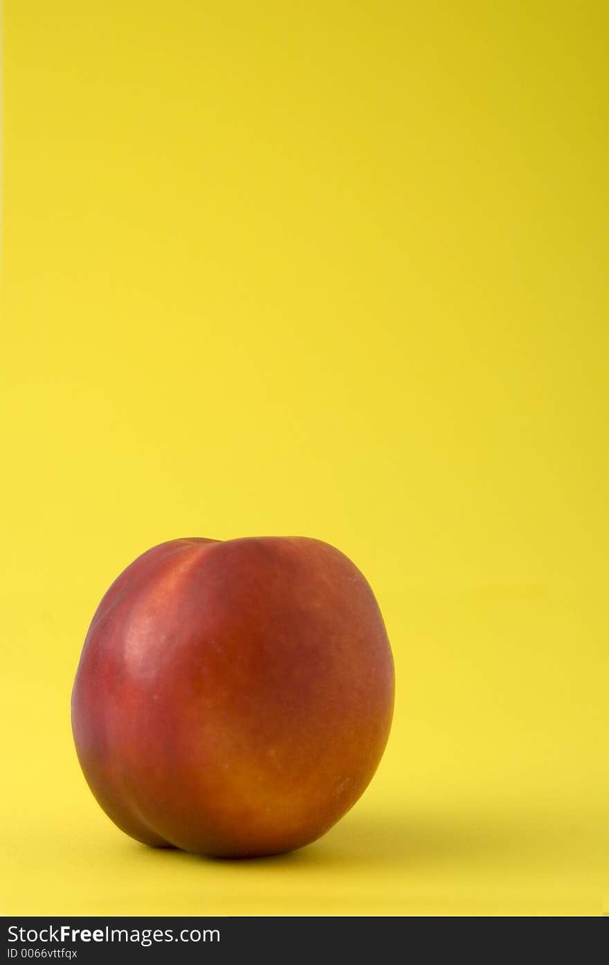 Peach against yellow backdrop