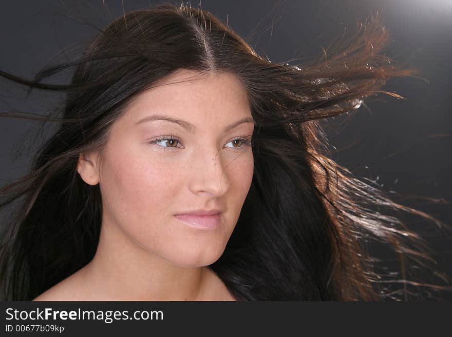 Young woman with long hair on the Wind. Young woman with long hair on the Wind