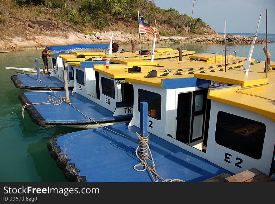 Boats in jetyt after snorkel trips, Pulua Redang, Malaysia. Boats in jetyt after snorkel trips, Pulua Redang, Malaysia