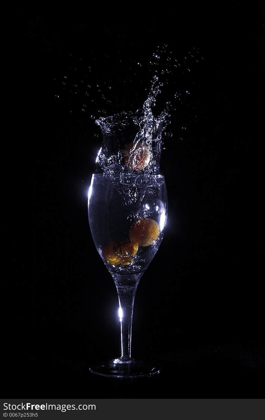 Fruit falling into glass. Fruit falling into glass