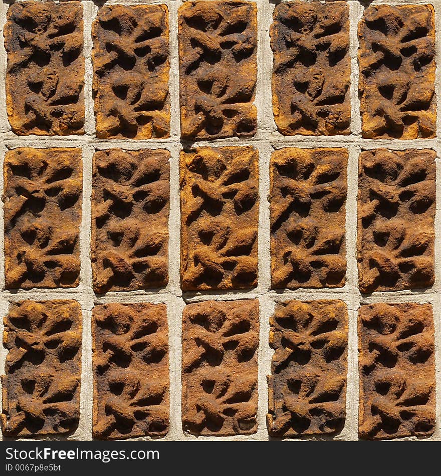 Seamless photo of an ornamented brick wall, medieval guild hall. Seamless photo of an ornamented brick wall, medieval guild hall.