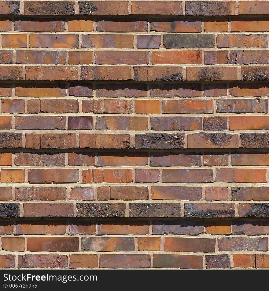 Seamless photo of an ornamented brick wall, 19th century. Seamless photo of an ornamented brick wall, 19th century.