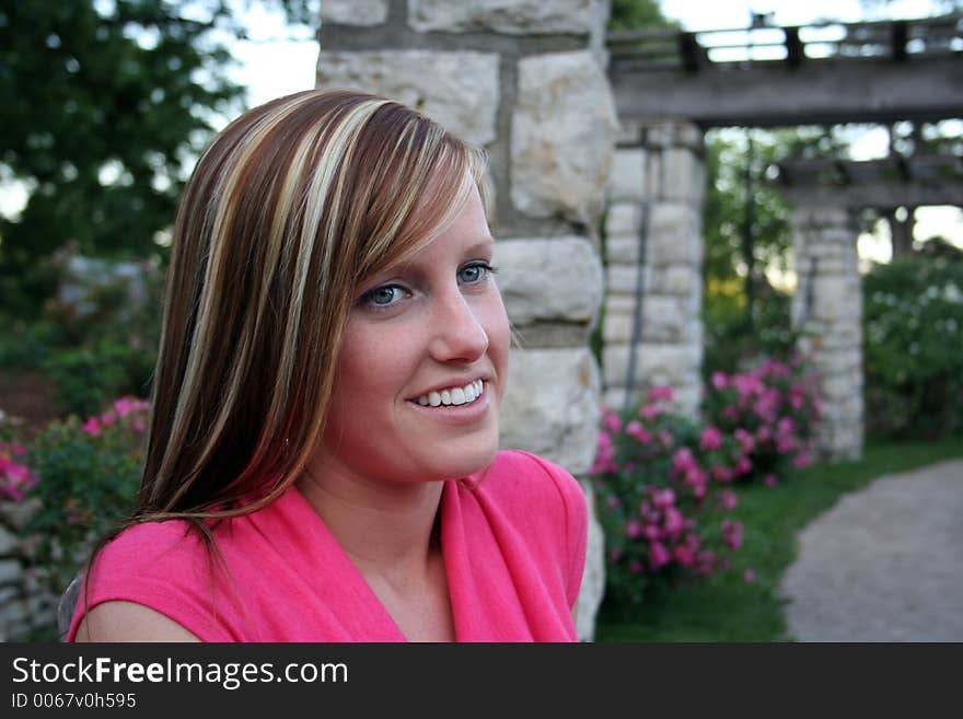 Woman posing in a garden. Woman posing in a garden