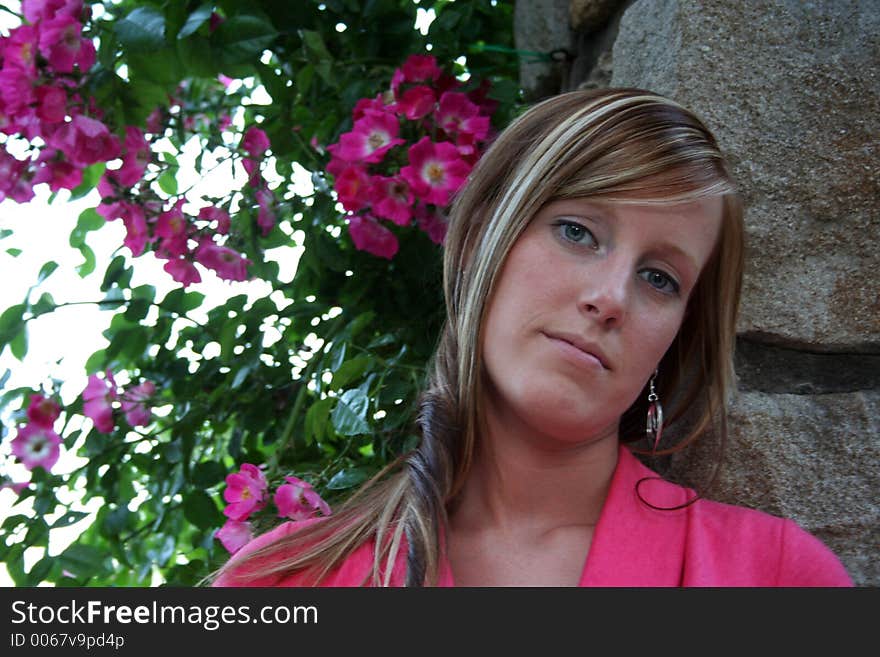 Woman posing in a garden. Woman posing in a garden