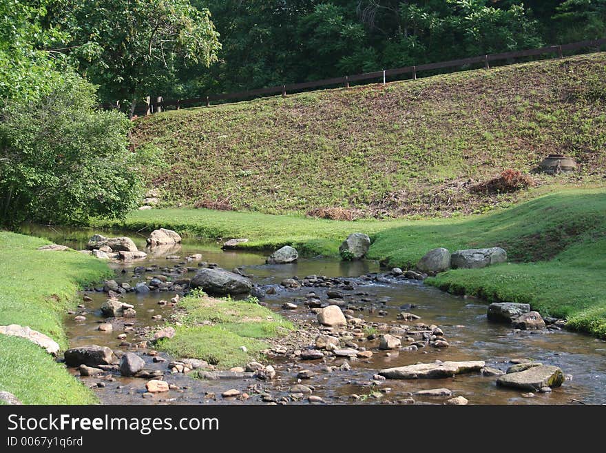 Stream at resort lake