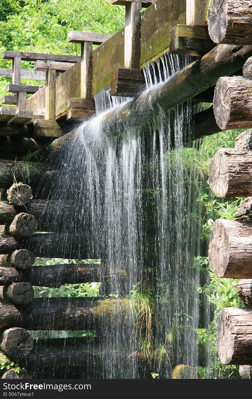 This is a picture of water running off a Old Mill trough. This is a picture of water running off a Old Mill trough.