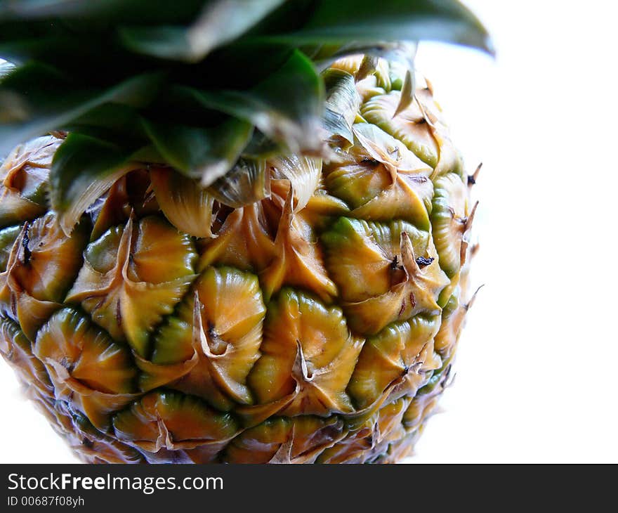 Fresh Pineapple against an white background. Fresh Pineapple against an white background