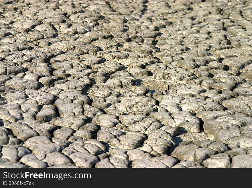 Mud texture detail from Mud Volcanoes - Buzau, Romania (unique geological phenomenon in Europe where the earth gas reaches the surface through hills making small Mud volcanoes)