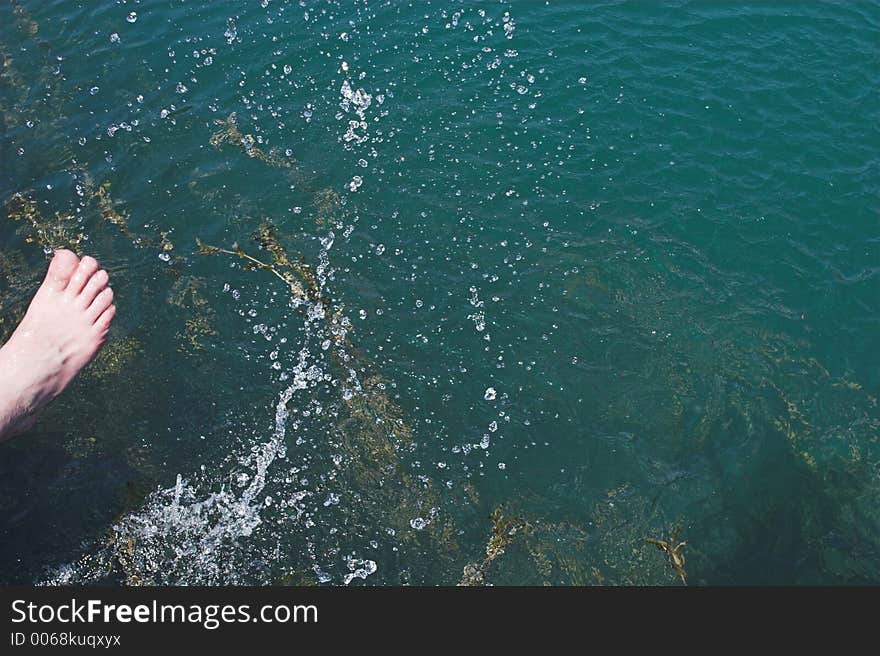 Girl splashing water