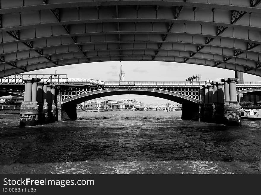 Shot from under the Blackfriars Bridge in London you can see many of the bridges crossing river Thames