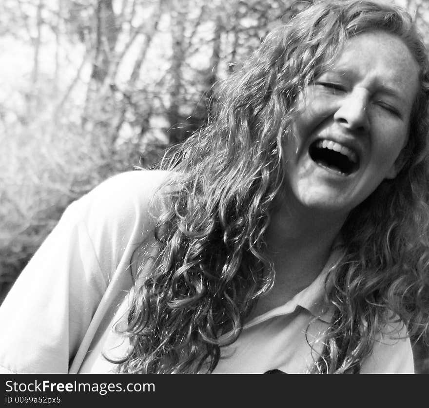 A girl smiling and laughing. A girl smiling and laughing.