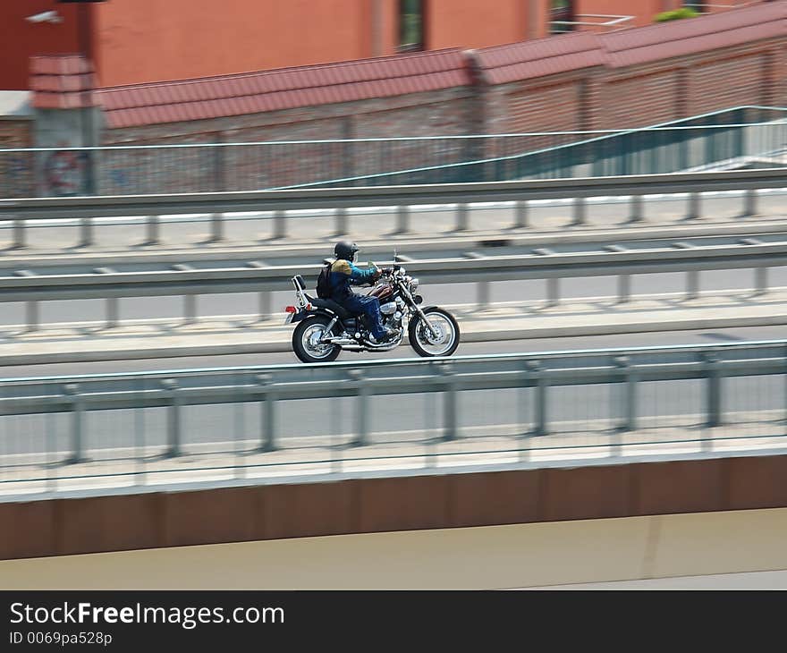 Lonely motorbike rider. Lonely motorbike rider