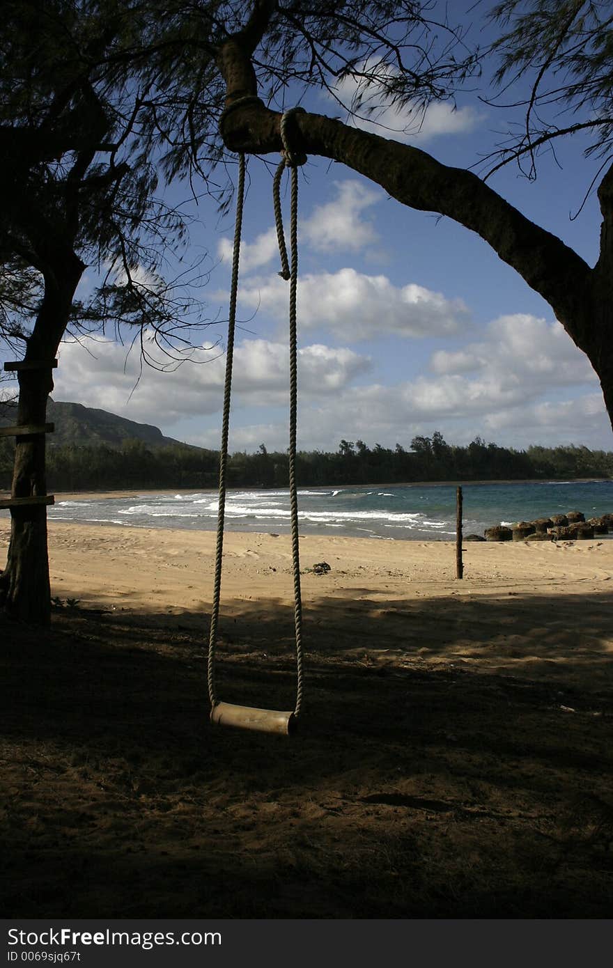 Beach scene with swing