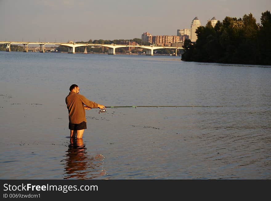 Alone fishman on the river