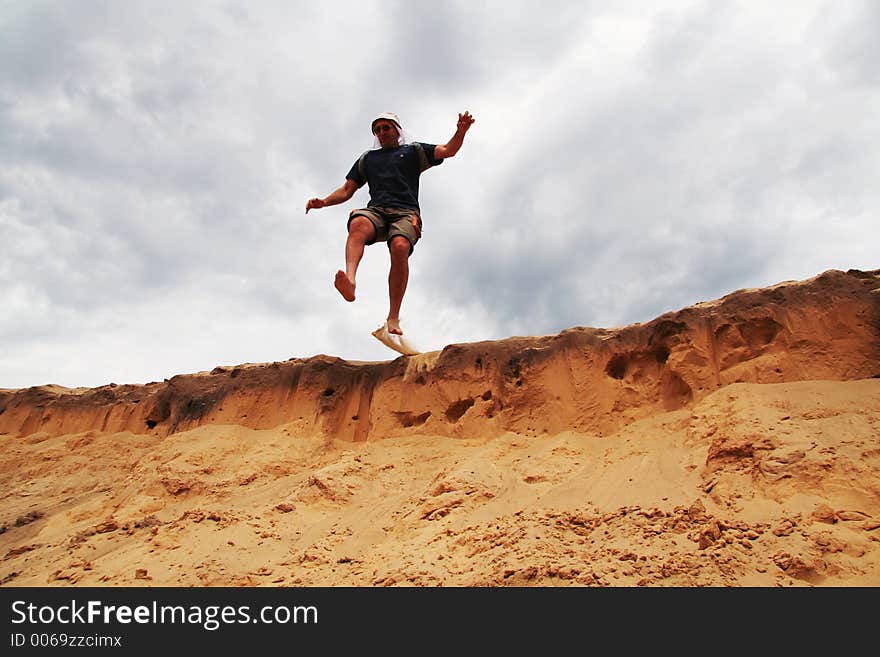 Jumping man over the beach. Jumping man over the beach