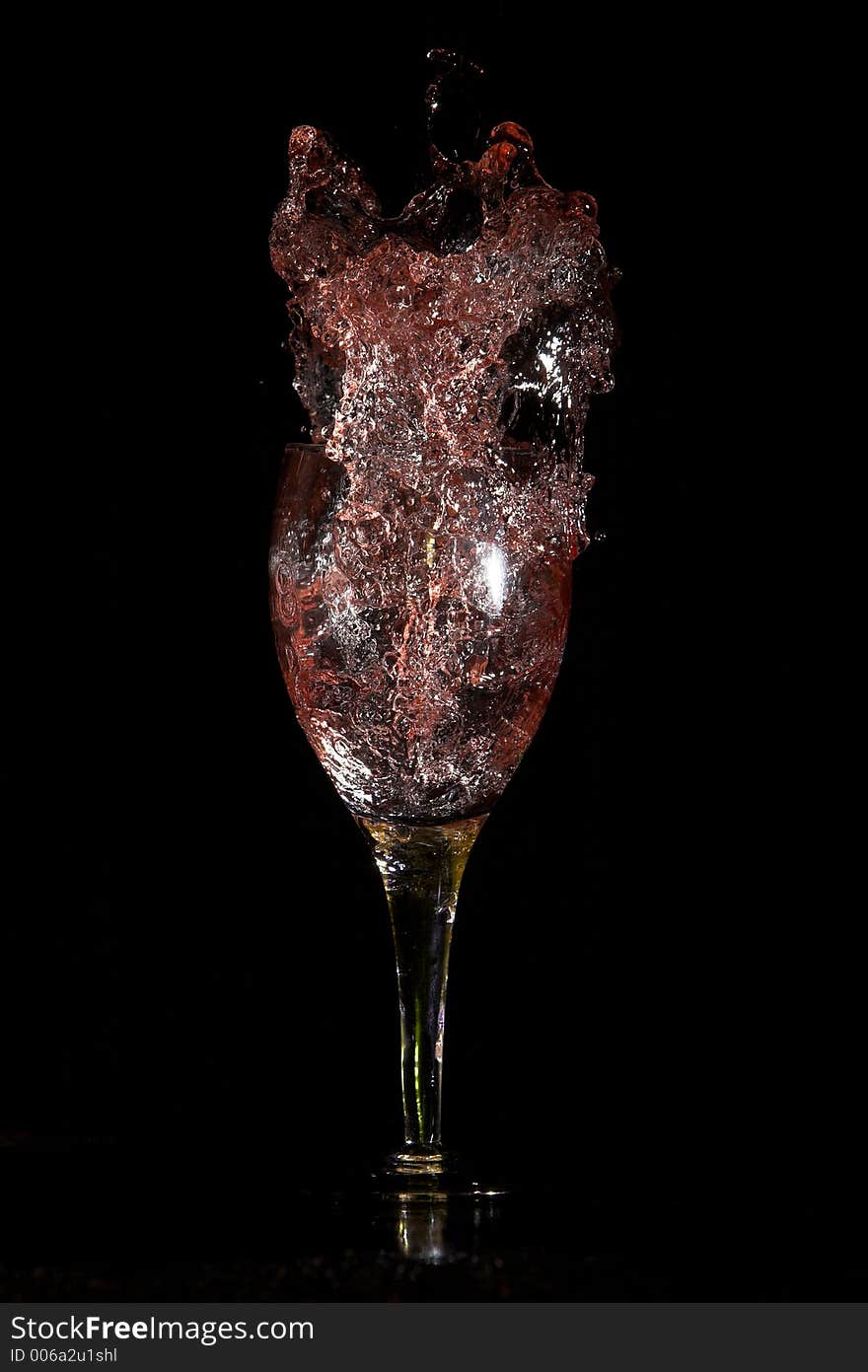 Wine exploding out of glass