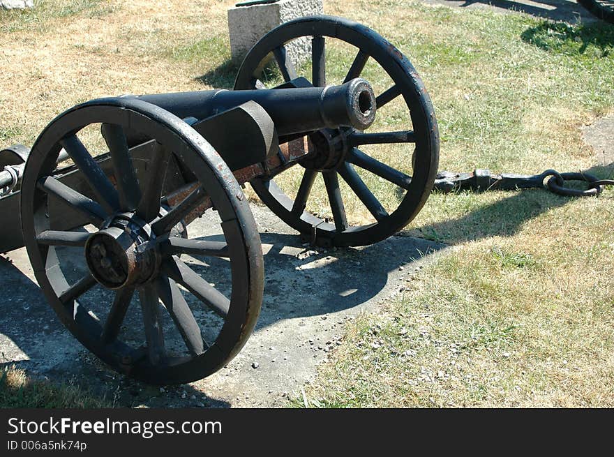 Old cannon in harbour