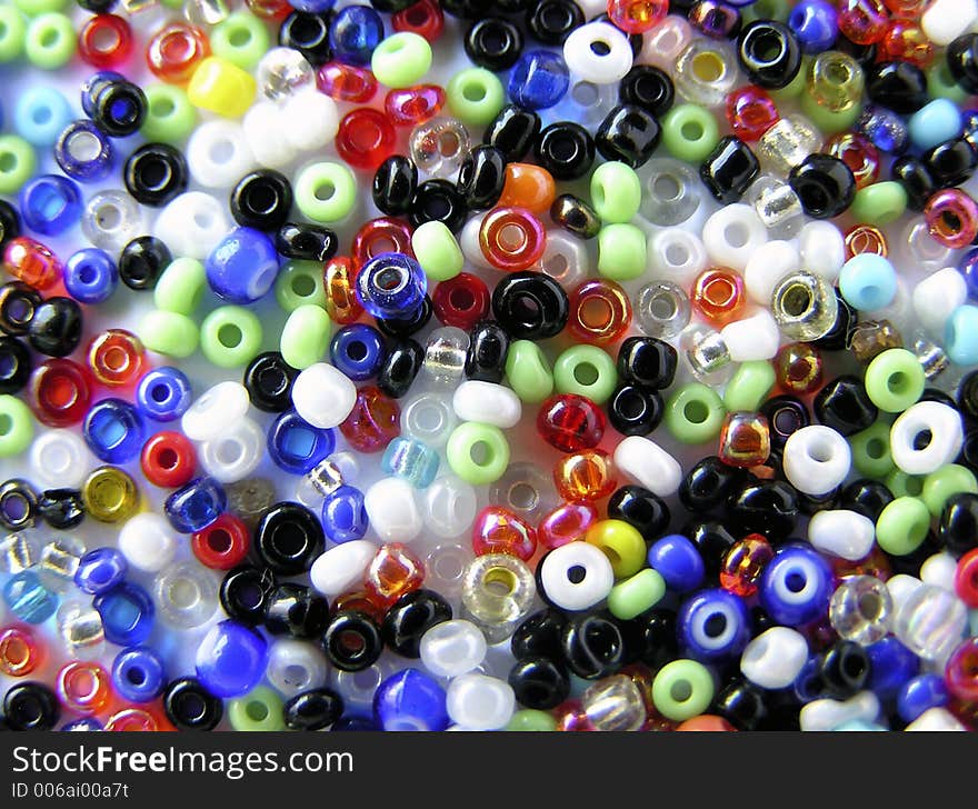 Poured out coral beads. Poured out coral beads