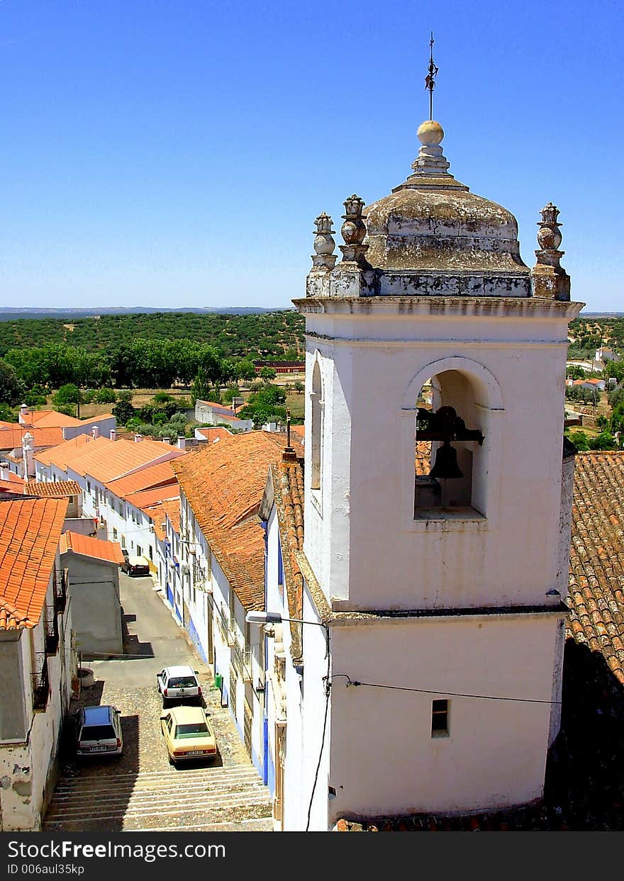 Typical street of the old and historical village of Alandroal, where if salient the sineira tower of the first church.