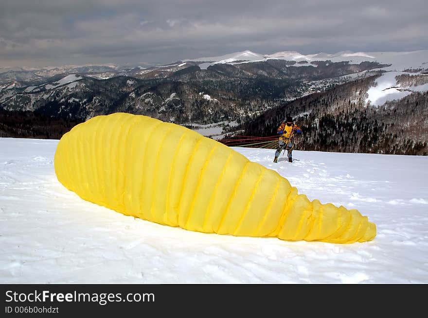 Yellow paraglider