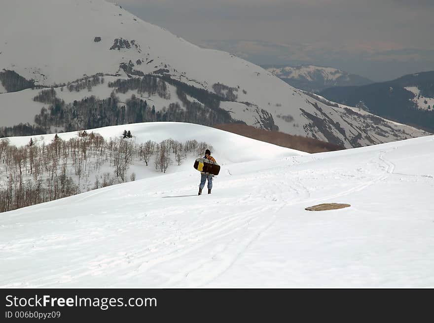 Man walking and preparing for extreme sport. Man walking and preparing for extreme sport