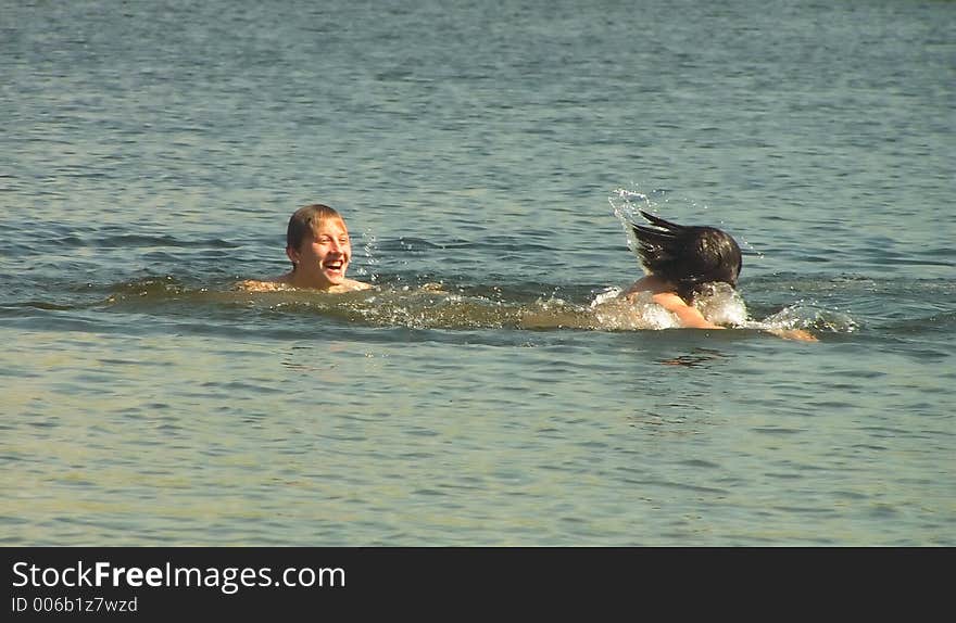 Two lads bathe. Two lads bathe