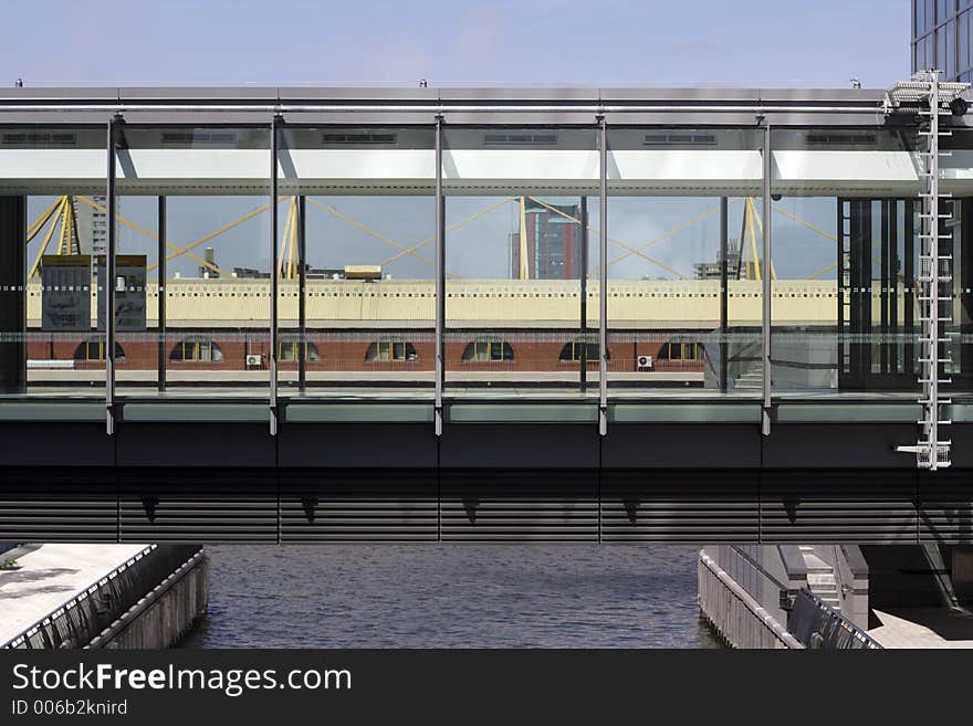 Glassed walkway bridge in docklands, london